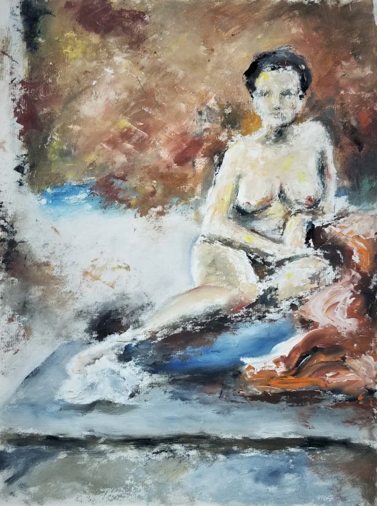 female nude model in art studio
