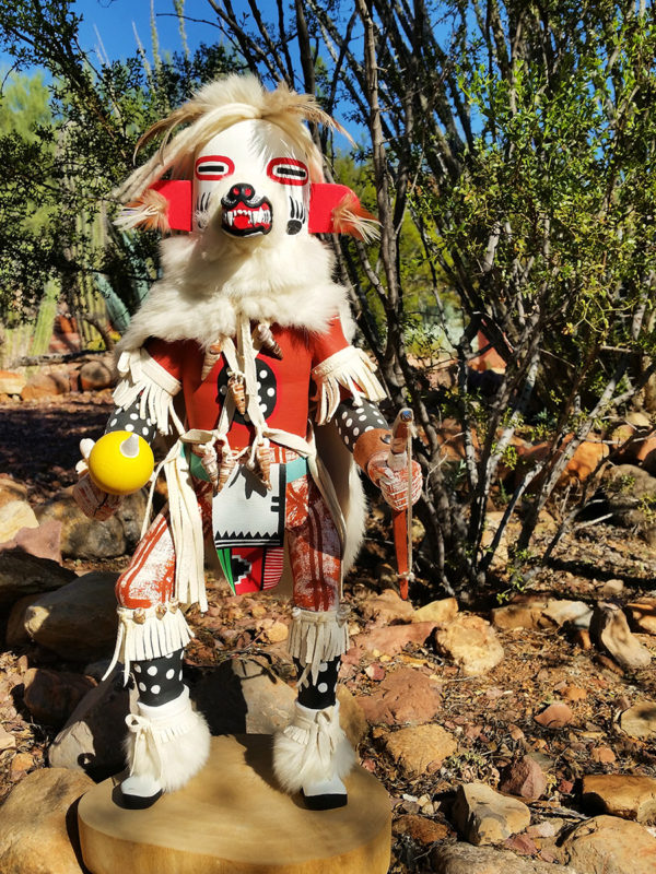 HON White Bear Warrior Kachina walking down from mountain