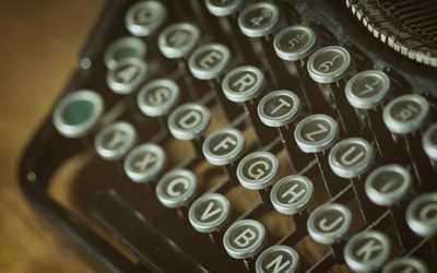 typewriter keys representing old school and new school of blogging