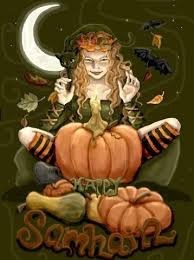 witch sitting by pumpkin